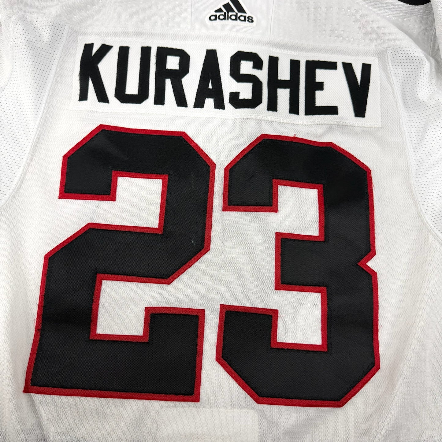 Philipp Kurashev #23 Away Chicago Blackhawks Game Worn Jersey 2023-2024, Set 2 | Size 56 | 1119-25580