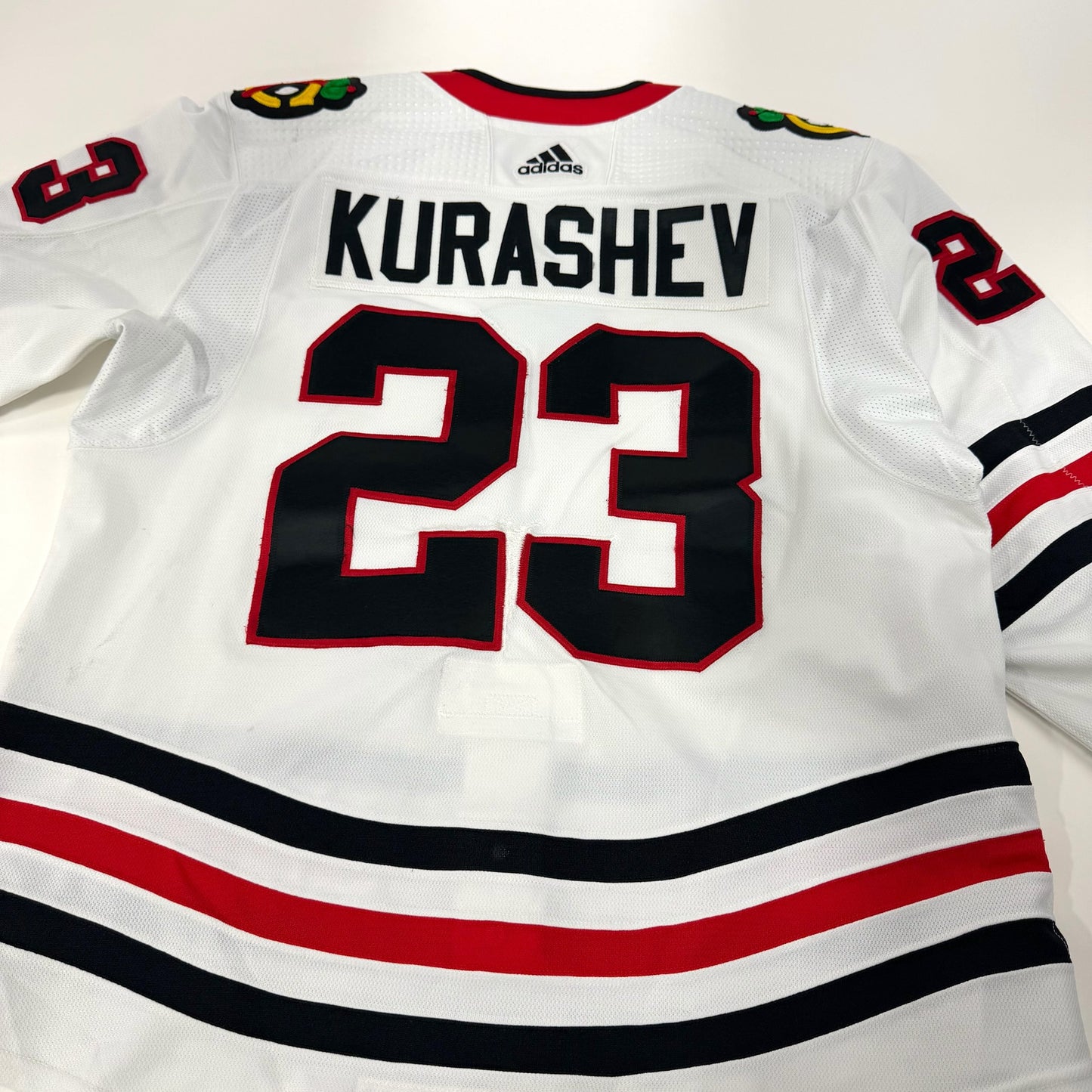 Philipp Kurashev #23 Away Chicago Blackhawks Game Worn Jersey 2022-2023, Set 1 | Size 56 | 4206-25535