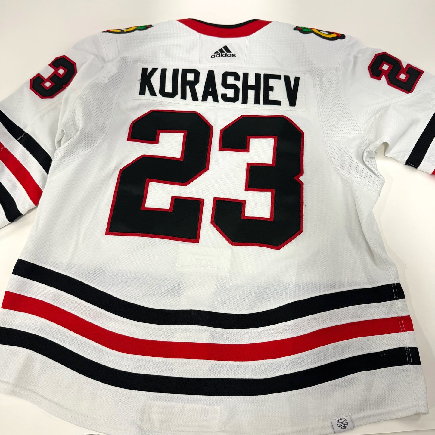 Philipp Kurashev #23 Away Chicago Blackhawks Game Worn Jersey 2022-2023, Set 2 | Size 56 | 2260-25525