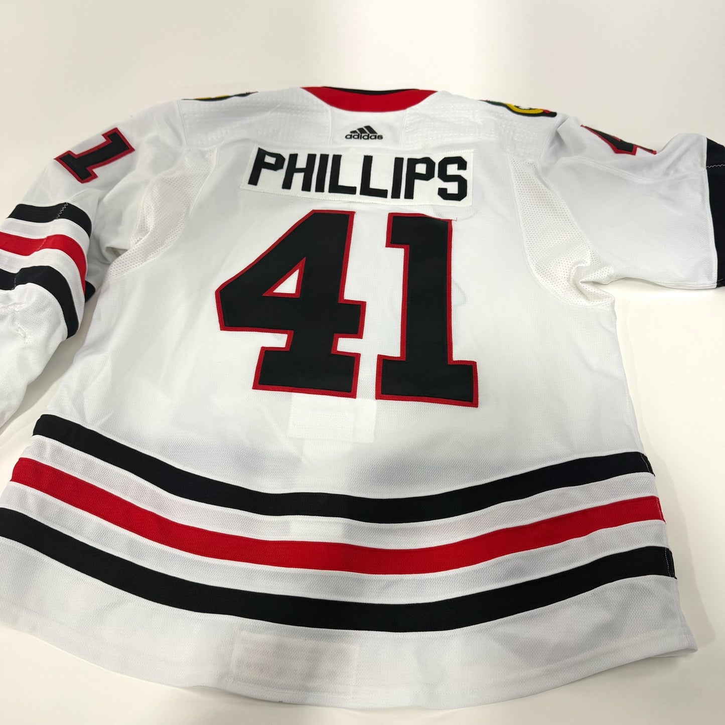 Isaak Phillips #41 Away Chicago Blackhawks Game Worn Jersey 2021-2022, Set 1 | Size 56 | 1928-25549