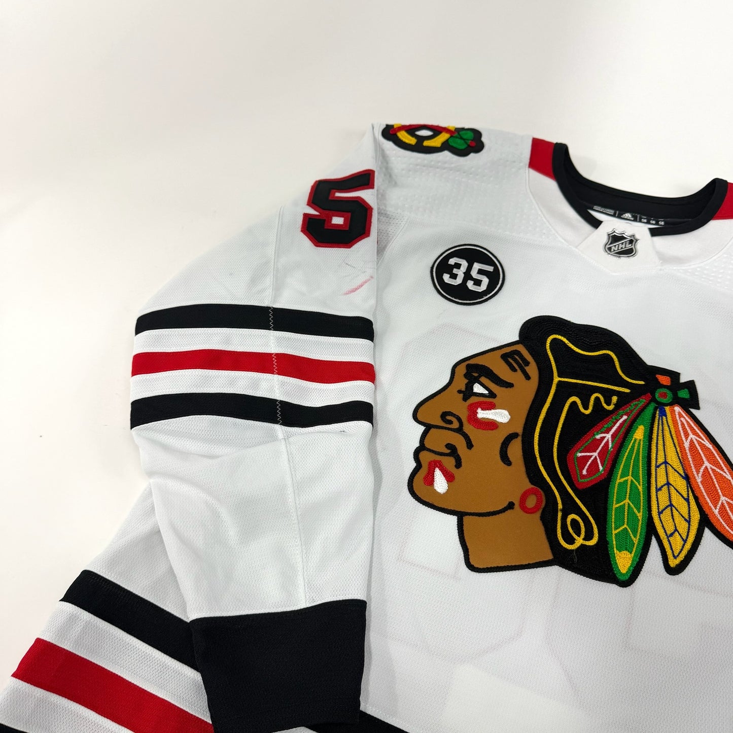 MacKenzie Entwistle #58 Away Chicago Blackhawks Game Worn Jersey 2021-2022, Set 1 | Size 58 | 7139-21901