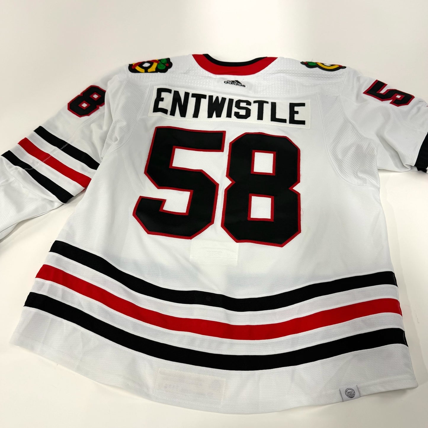 MacKenzie Entwistle #58 Away Chicago Blackhawks Game Worn Jersey 2021-2022, Set 1 | Size 58 | 7139-21901