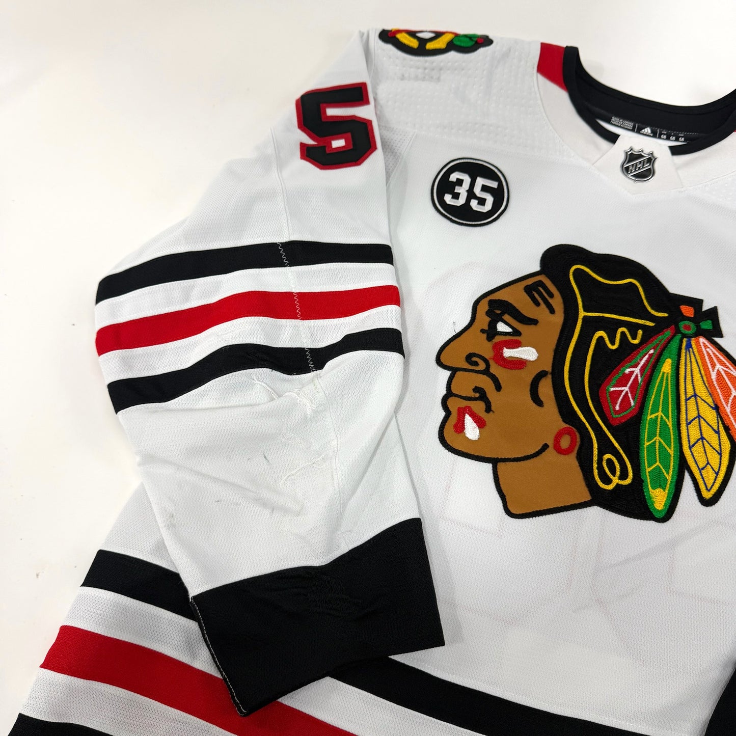 MacKenzie Entwistle #58 Away Chicago Blackhawks Game Worn Jersey 2021-2022, Set 2 | Size 58 | 8409-25551