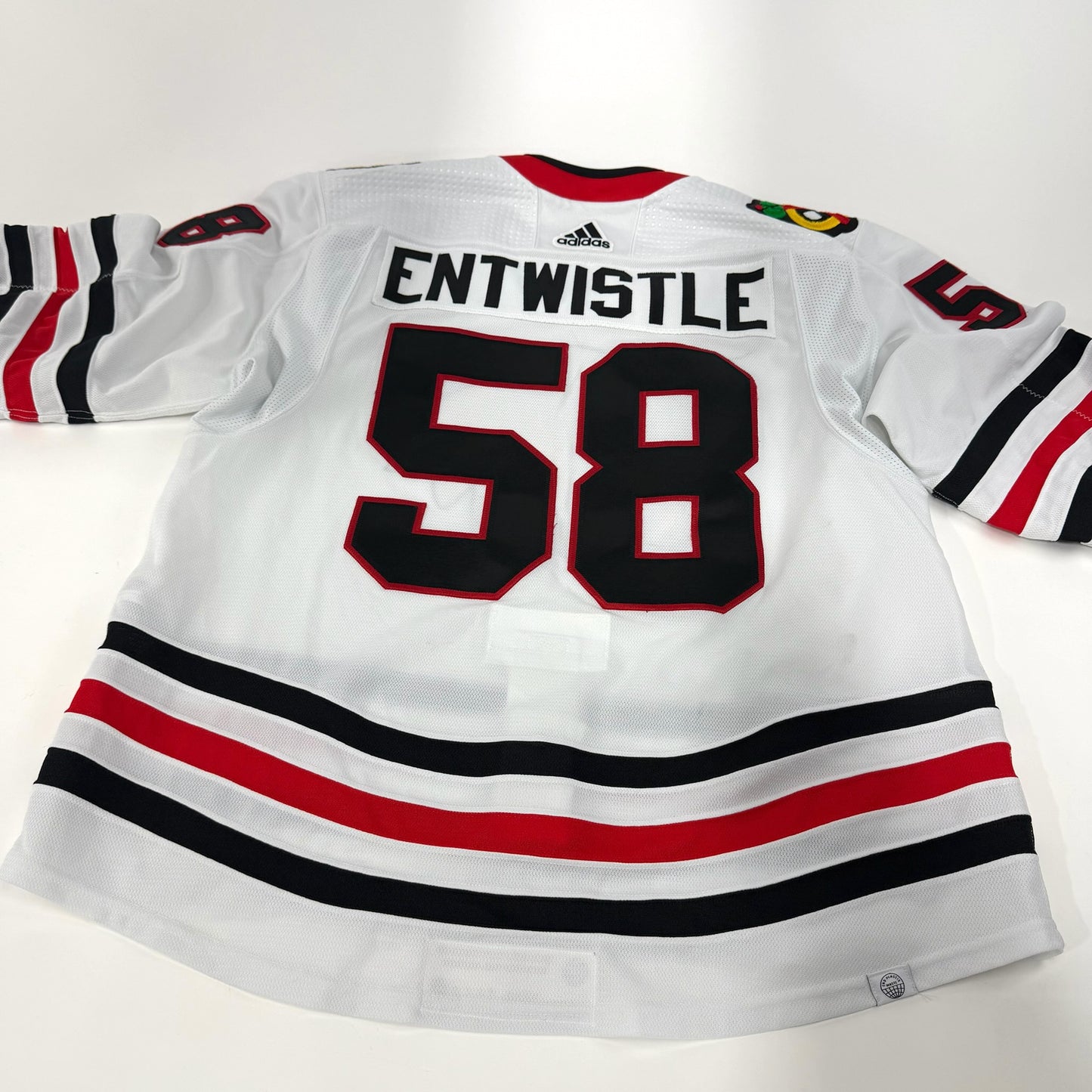 MacKenzie Entwistle #58 Away Chicago Blackhawks Game Worn Jersey 2023-2024, Set 2 | Size 58 | 6017-23752