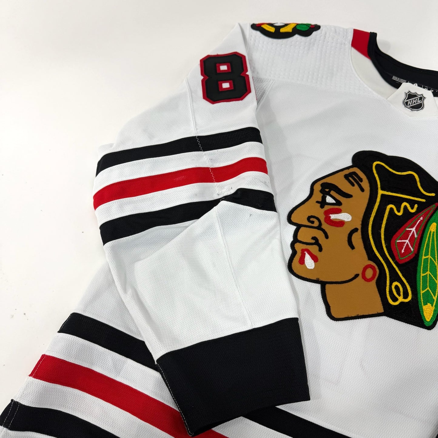 Caleb Jones #82 Away Chicago Blackhawks Game Worn Jersey 2022-2023, Set 2 | Size 58 | 2171-25511