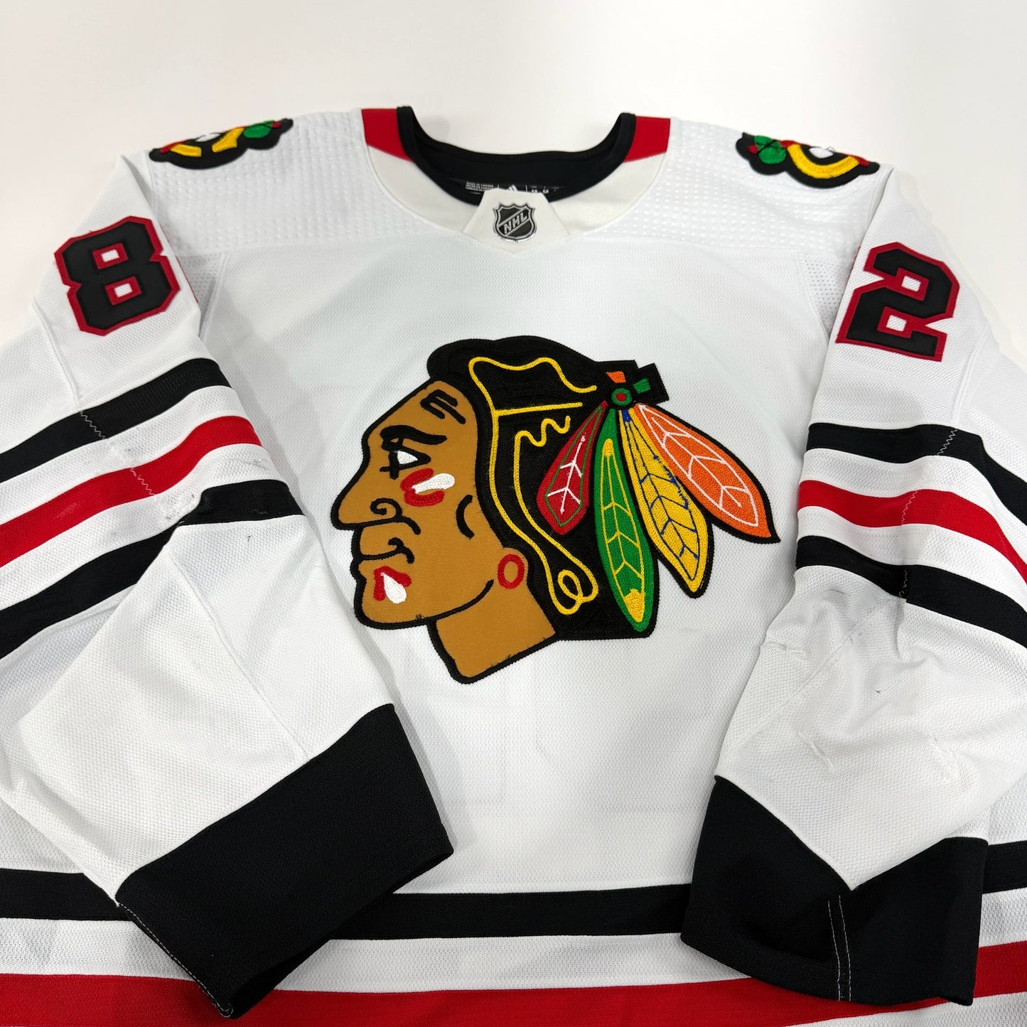 Caleb Jones #82 Away Chicago Blackhawks Game Worn Jersey 2022-2023, Set 2 | Size 58 | 2171-25511