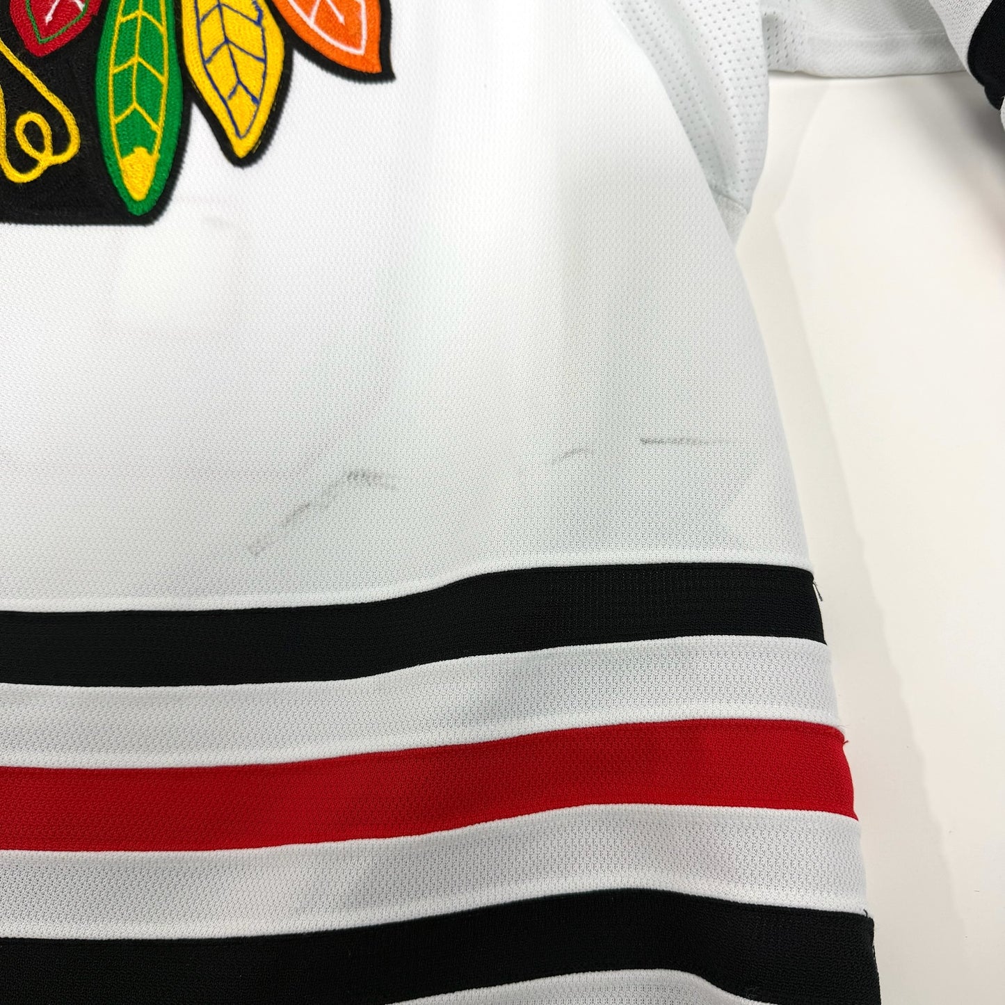 Caleb Jones #82 Away Chicago Blackhawks Game Worn Jersey 2022-2023, Set 2 | Size 58 | 2171-25511