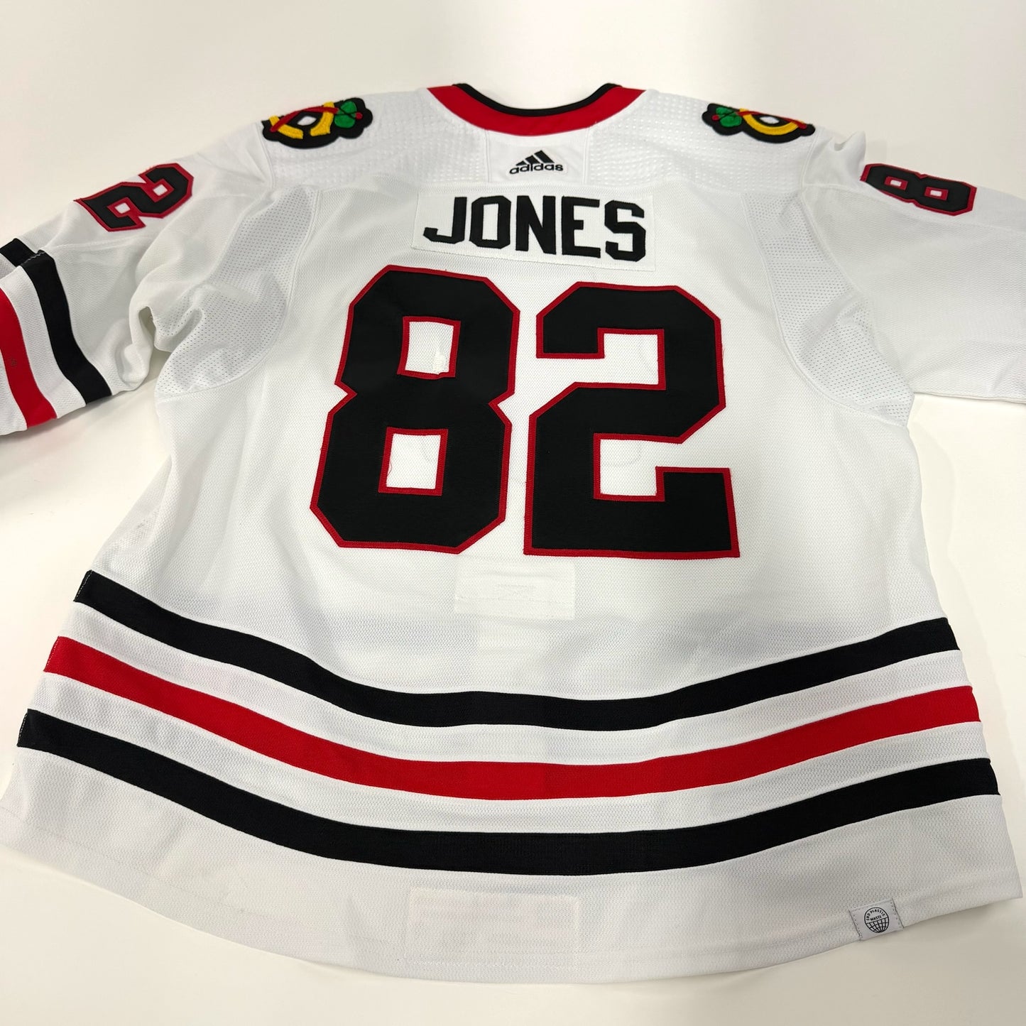 Caleb Jones #82 Away Chicago Blackhawks Game Worn Jersey 2022-2023, Set 2 | Size 58 | 2171-25511