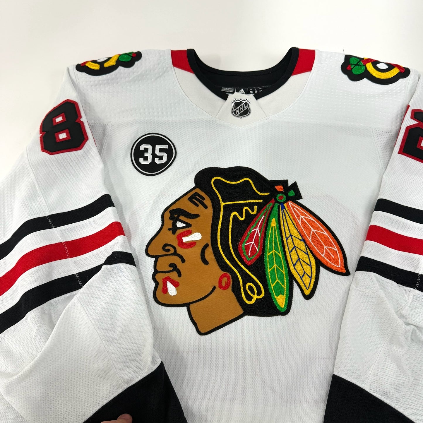 Caleb Jones #82 Away Chicago Blackhawks Game Worn Jersey 2021-2022, Set 1 | Size 58 | 3249-25559