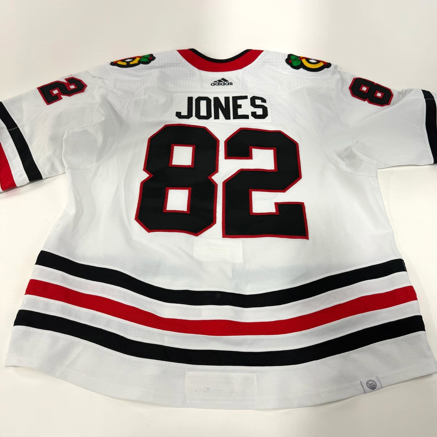 Caleb Jones #82 Away Chicago Blackhawks Game Worn Jersey 2021-2022, Set 1 | Size 58 | 3249-25559