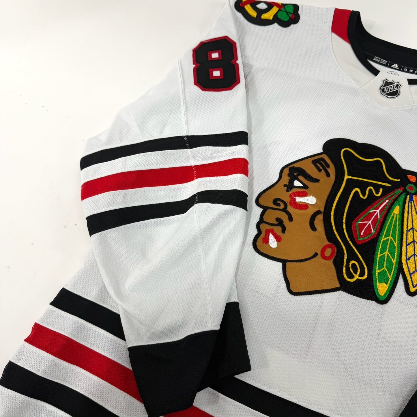 Caleb Jones #82 Away Chicago Blackhawks Game Worn Jersey 2022-2023, Set 1 | Size 58 | 895-25512