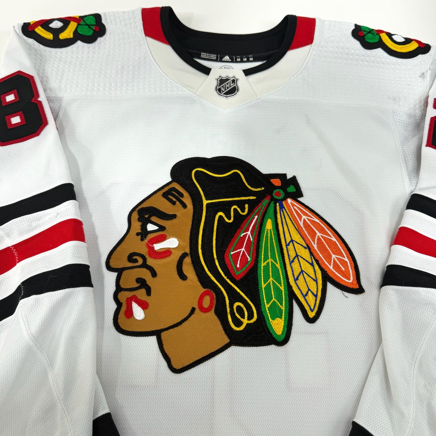 Caleb Jones #82 Away Chicago Blackhawks Game Worn Jersey 2022-2023, Set 1 | Size 58 | 895-25512