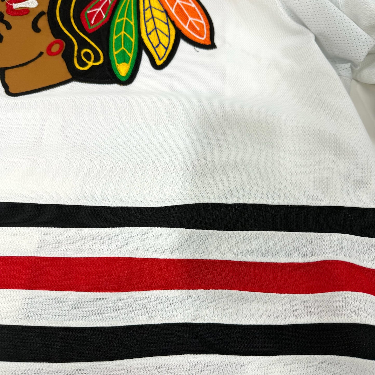 Caleb Jones #82 Away Chicago Blackhawks Game Worn Jersey 2022-2023, Set 1 | Size 58 | 895-25512