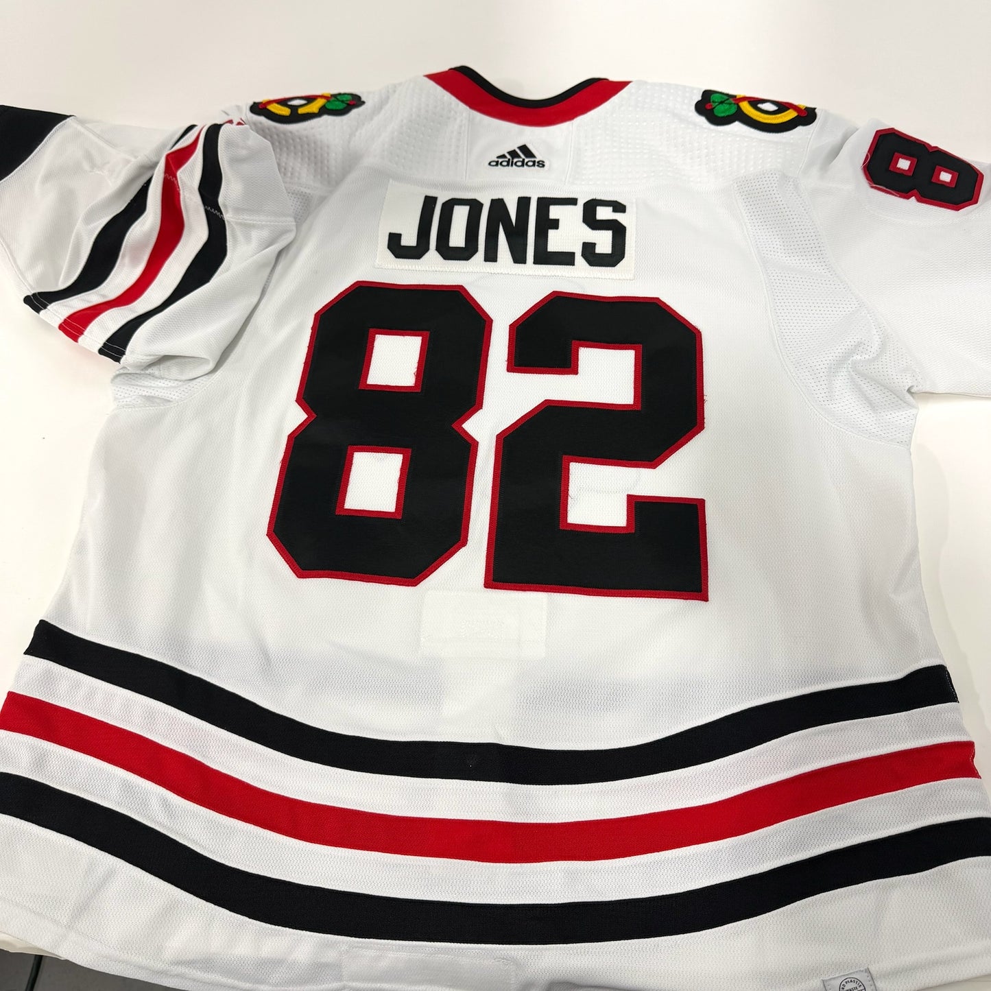 Caleb Jones #82 Away Chicago Blackhawks Game Worn Jersey 2022-2023, Set 1 | Size 58 | 895-25512