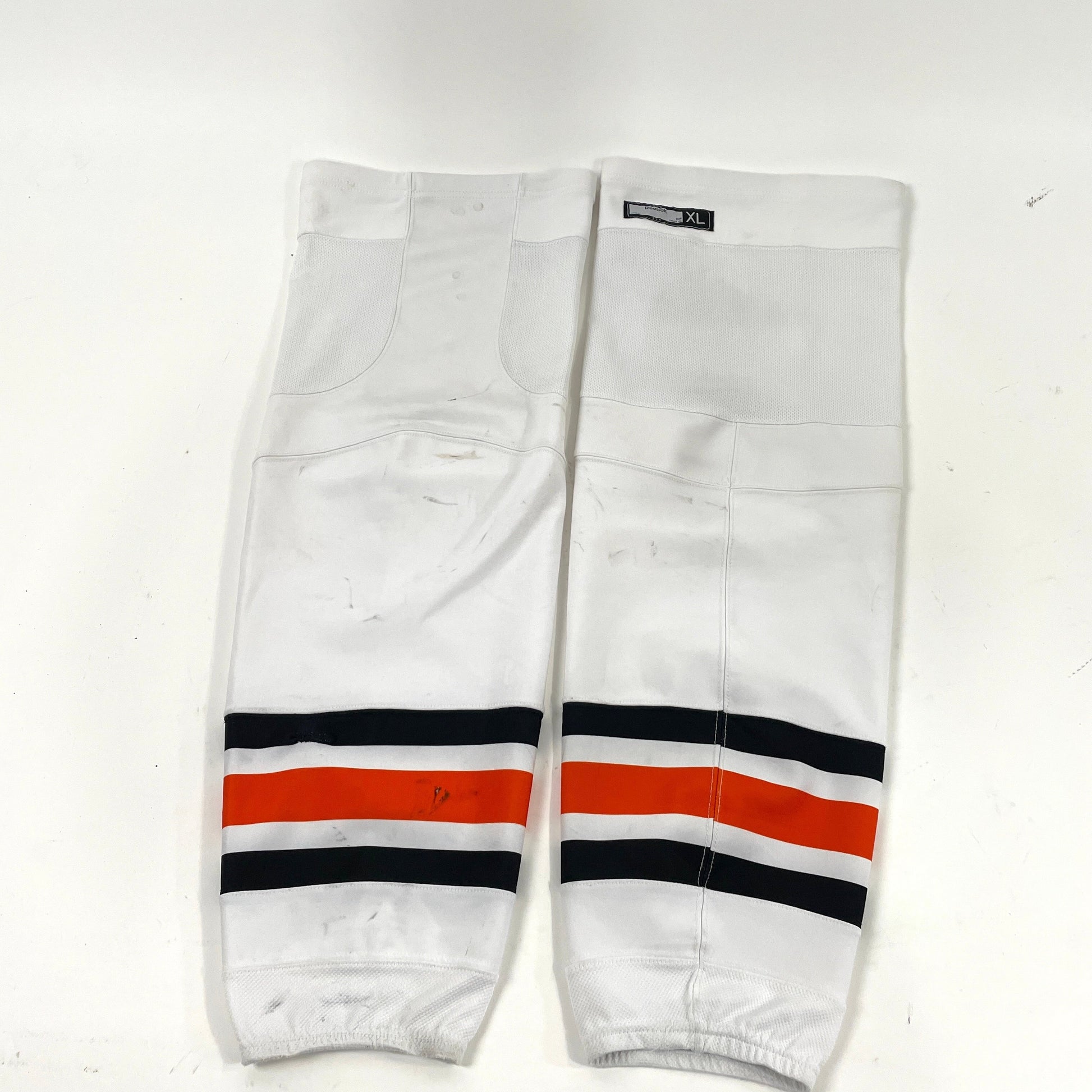 Used White, Black, and Orange Reebok Socks | Size XL - Top Flight Hockey