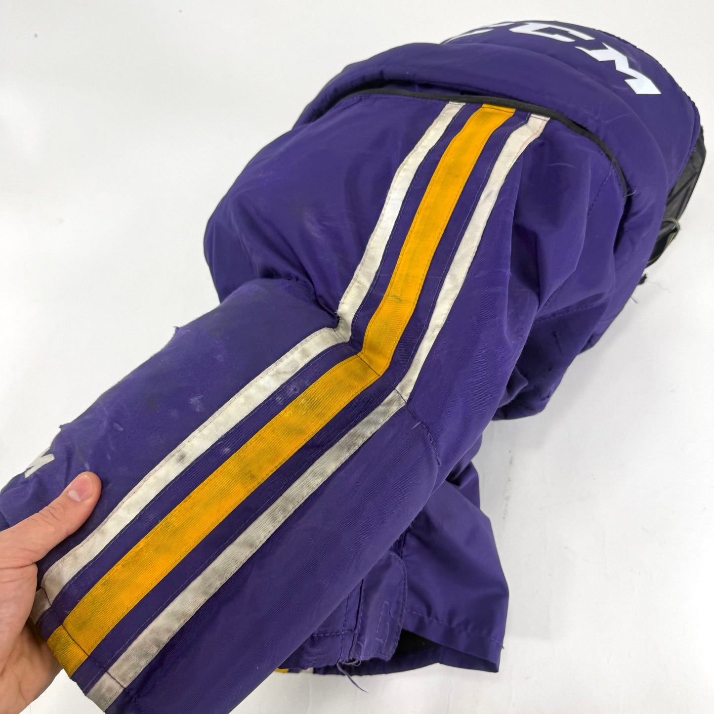 Used Purple/Yellow CCM Tacks 65C Pants | Large | E531
