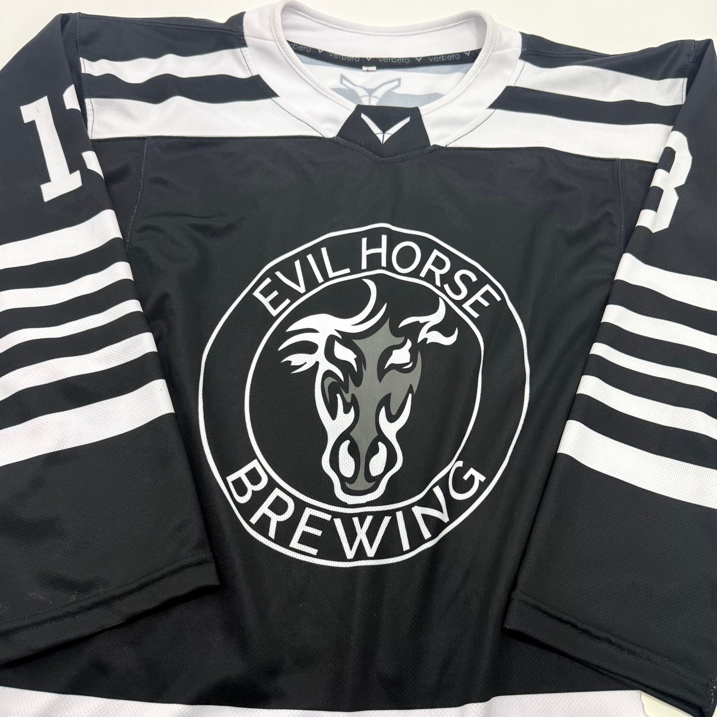Used Black and White Verbero Evil Horse Brewing Jersey | Large | A95 - Top Flight Hockey