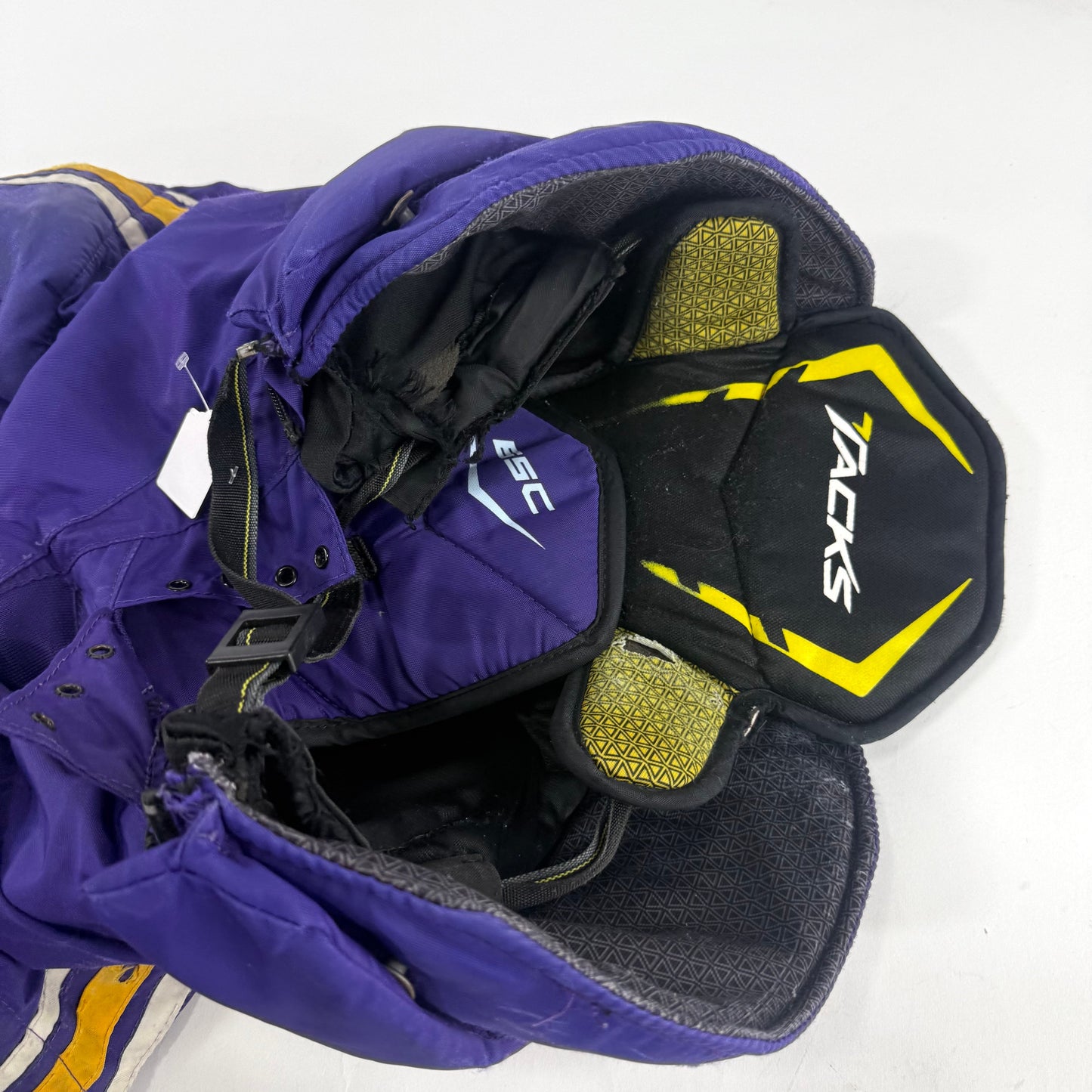 Used Purple/Yellow CCM Tacks 65C Pants | Small | E549