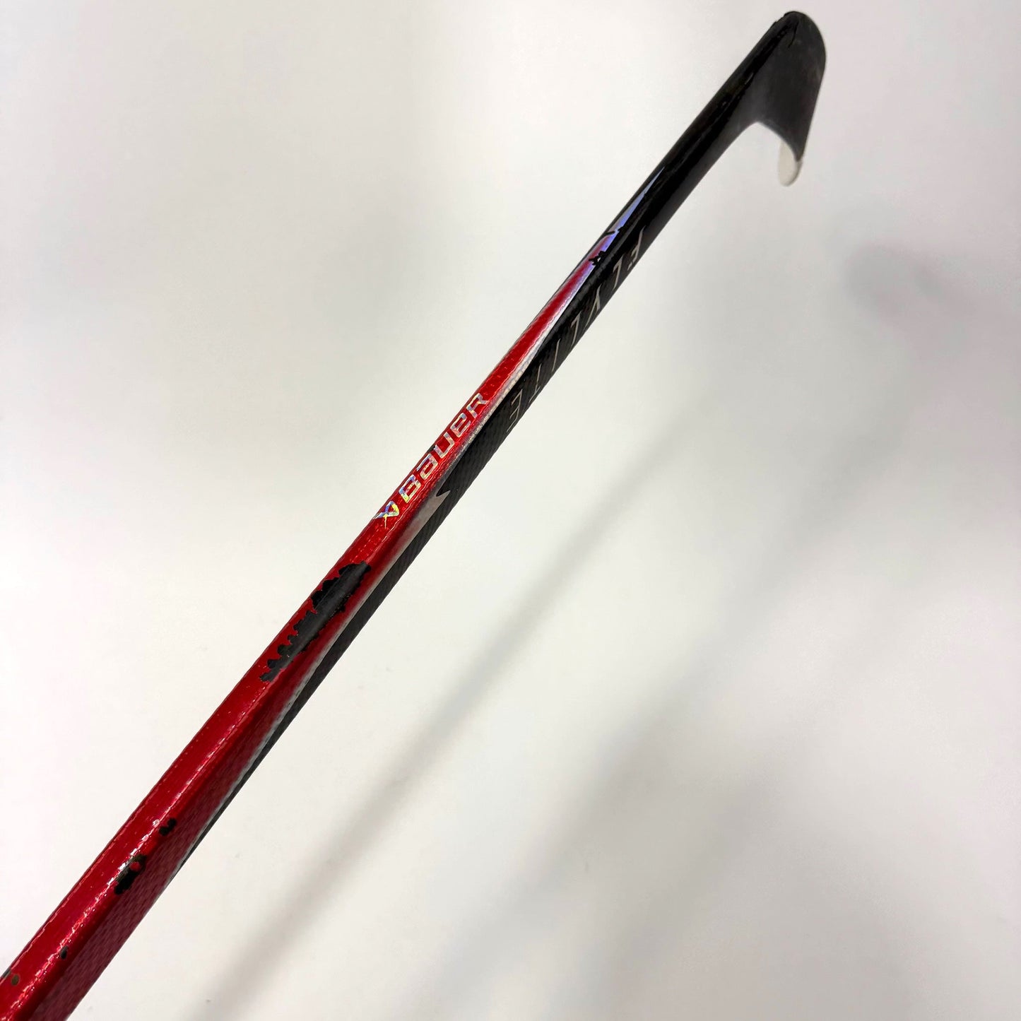 Used Left Red Bauer Flylite | 77 Flex P28M Curve Grip | AB979