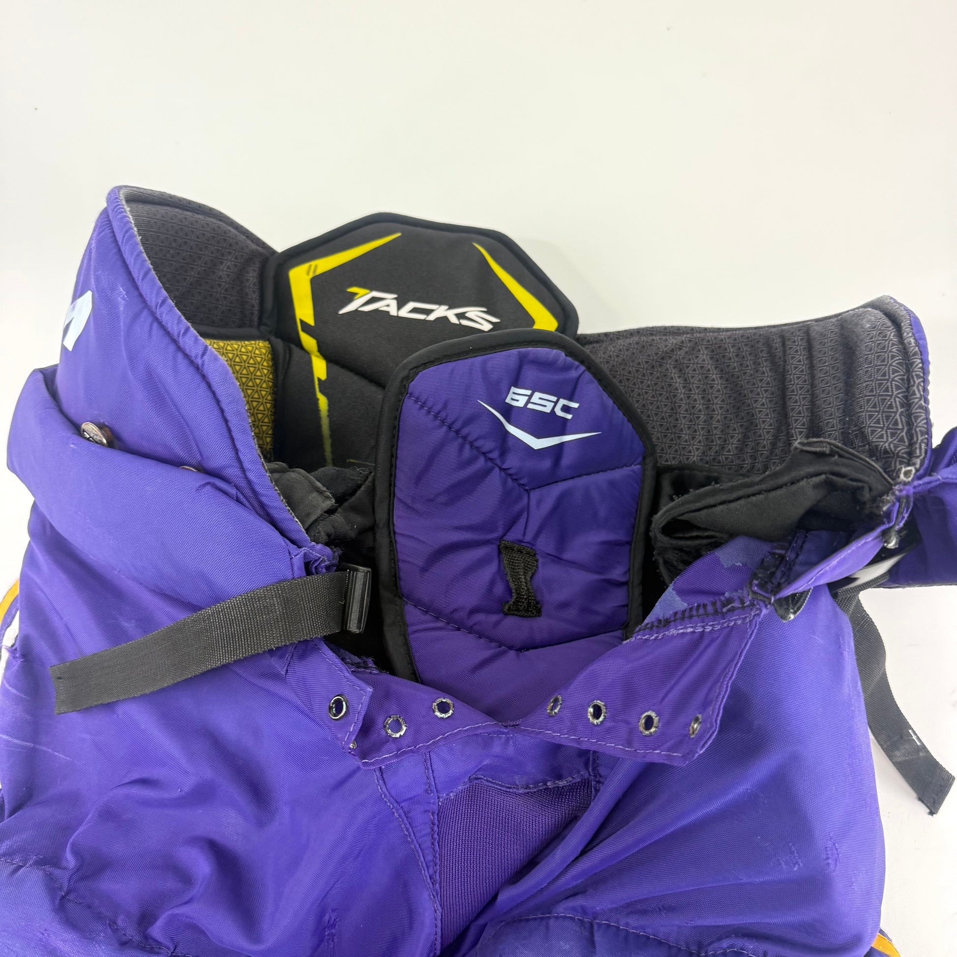 Used Purple/Yellow CCM Tacks 65C Pants | Large | E538 - Top Flight Hockey