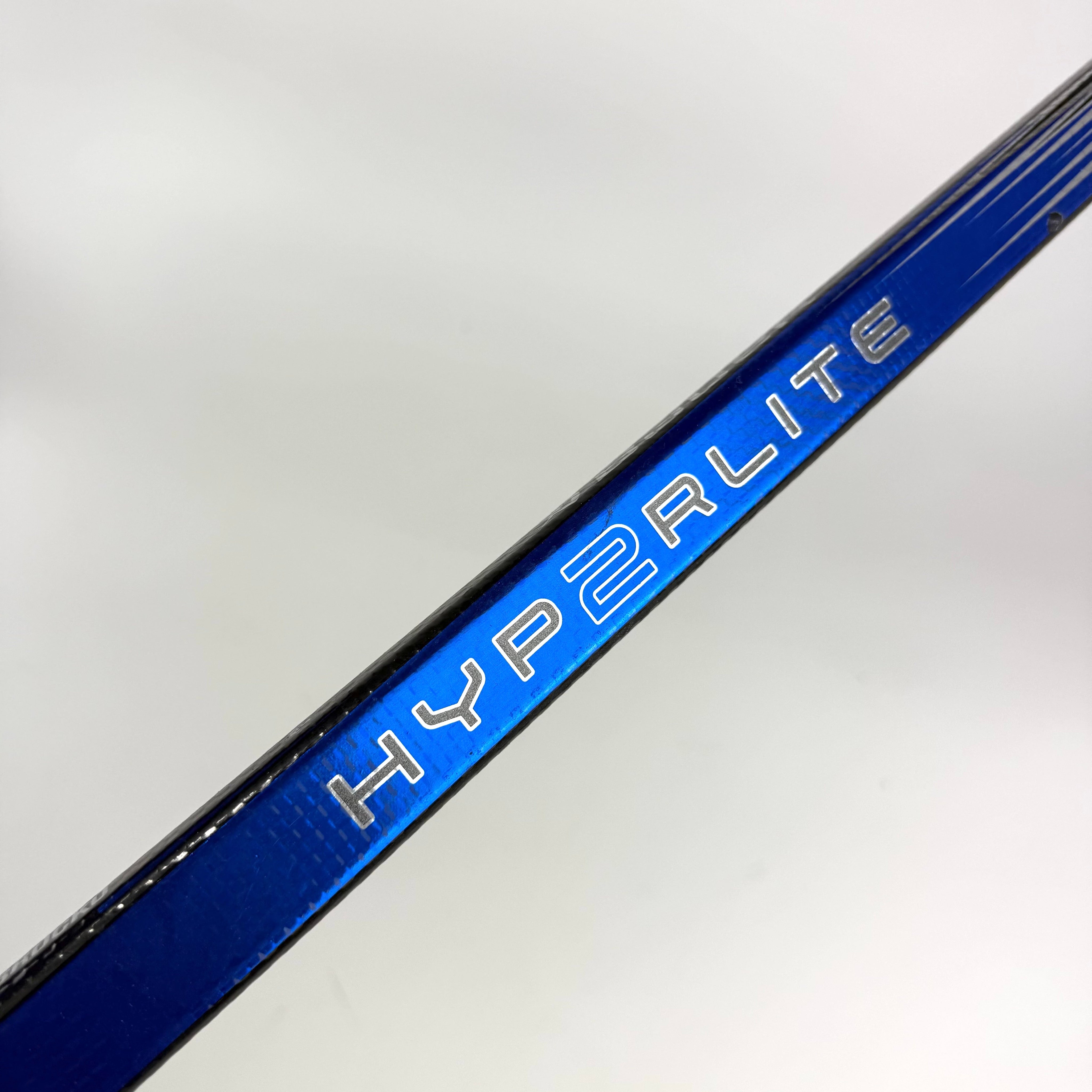 Repaired Left Blue Bauer Vapor Hyperlite 2 | 87 Flex P92M Curve Grip | D21 - Top Flight Hockey