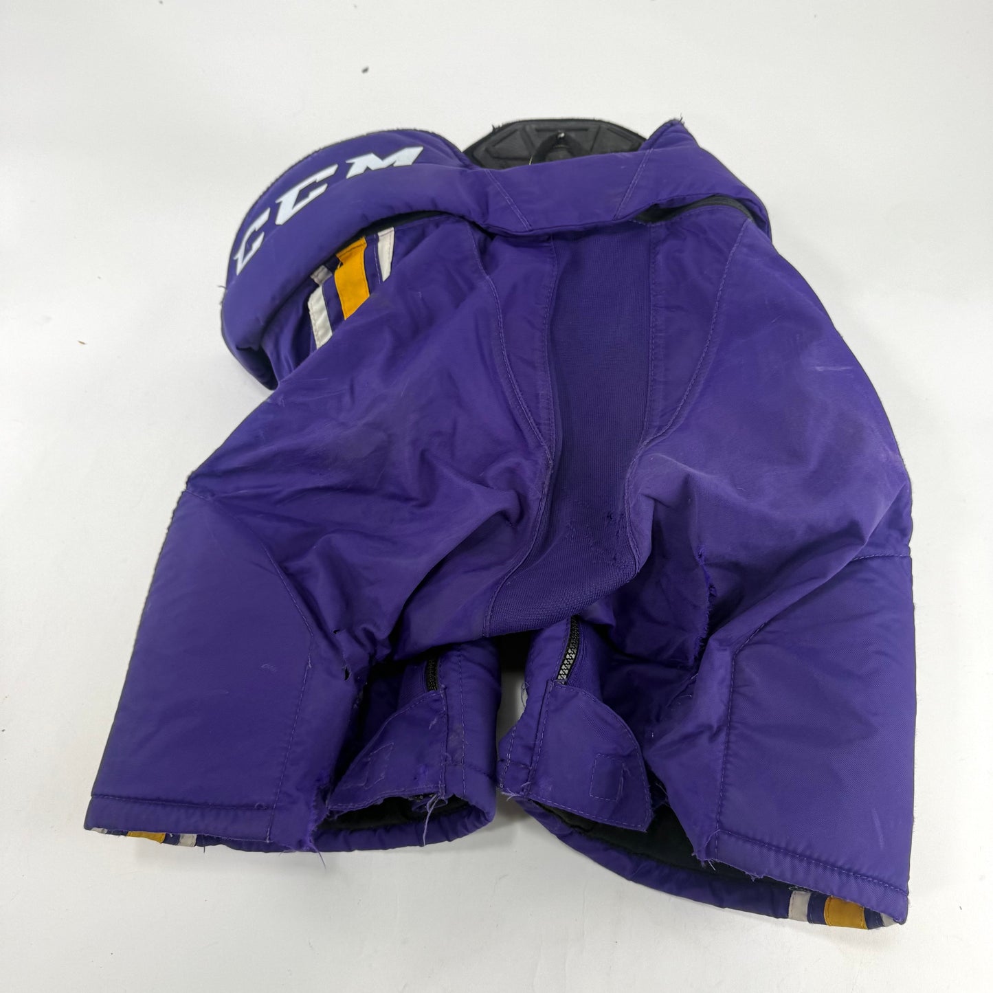 Used Purple/Yellow CCM Tacks 65C Pants | Small | E549