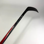 Used Left Red Bauer Flylite | 87 Flex P28M Curve Grip | J566 - Top Flight Hockey