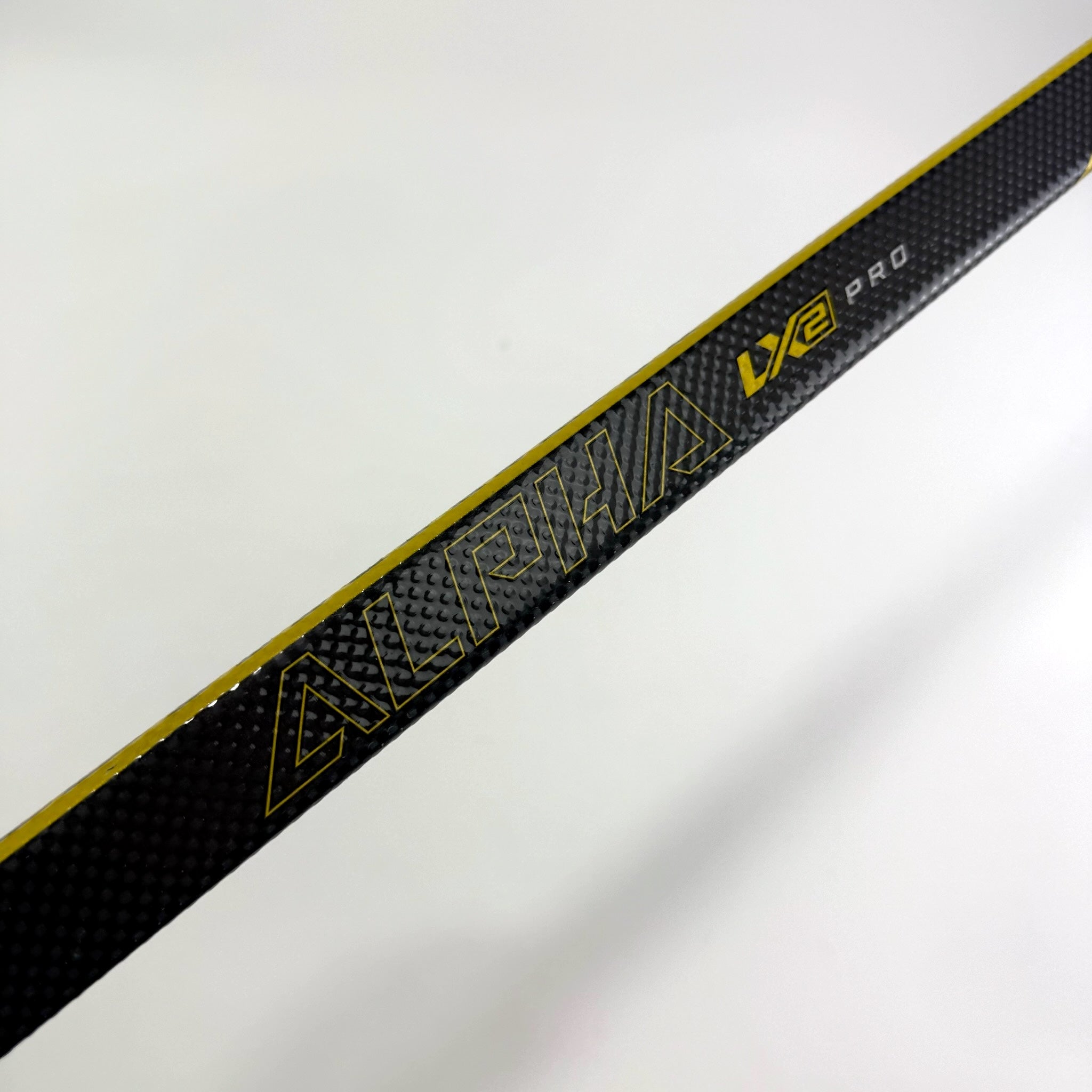 Used Left Yellow Warrior Alpha LX2 Pro | 85 Flex P28 Curve Grip | F362 - Top Flight Hockey