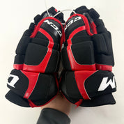 Used Chicago Blackhawks CCM HGCL 13" Gloves | Caleb Jones | L362 - Top Flight Hockey