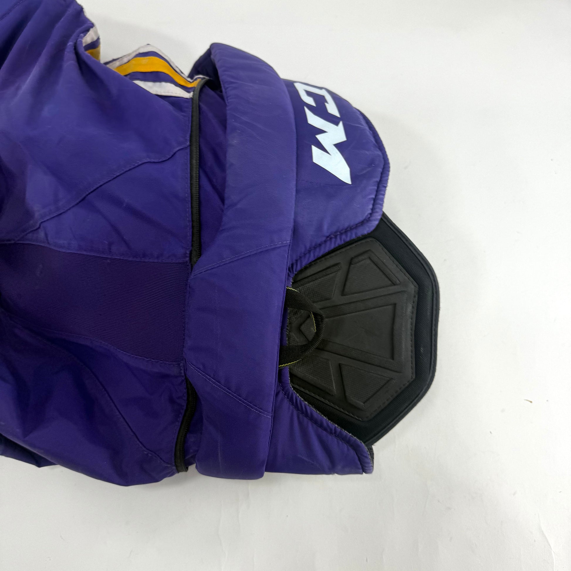 Used Purple/Yellow CCM Tacks 65C Pants | Medium | E541 - Top Flight Hockey