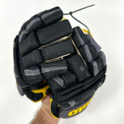 Used Black and Gold Warrior Covert QRE Pro Gloves | 14" | K349 - Top Flight Hockey