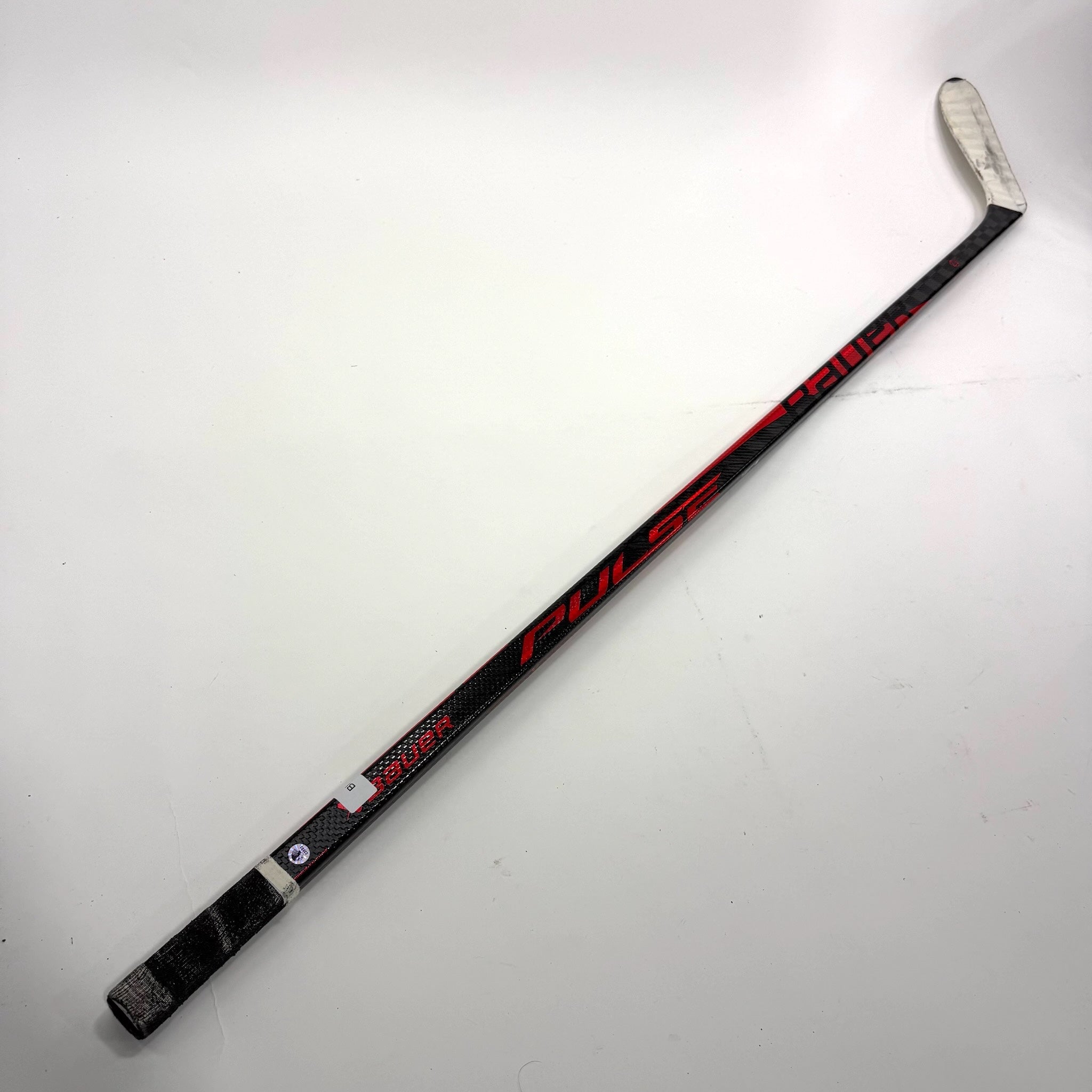 Used Left Red Bauer Pulse | 87 Flex P28 Curve Grip | Matt Gryzelcyk | BH133 - Top Flight Hockey