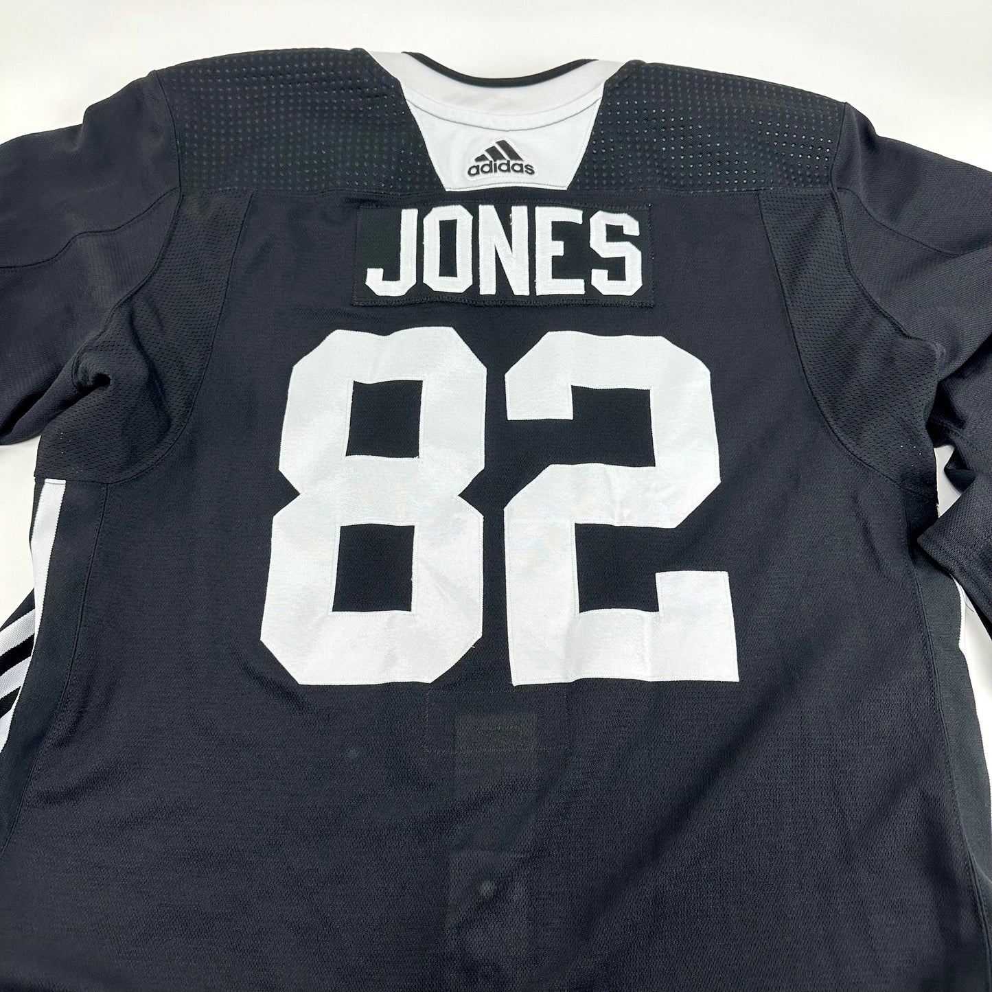 JONES #82 - Black Chicago Blackhawks Practice Jersey - Adidas MIC Size 58 - Top Flight Hockey