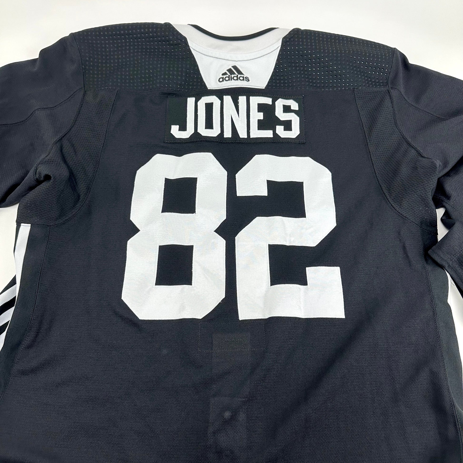 JONES #82 - Black Chicago Blackhawks Practice Jersey - Adidas MIC Size 58 - Top Flight Hockey