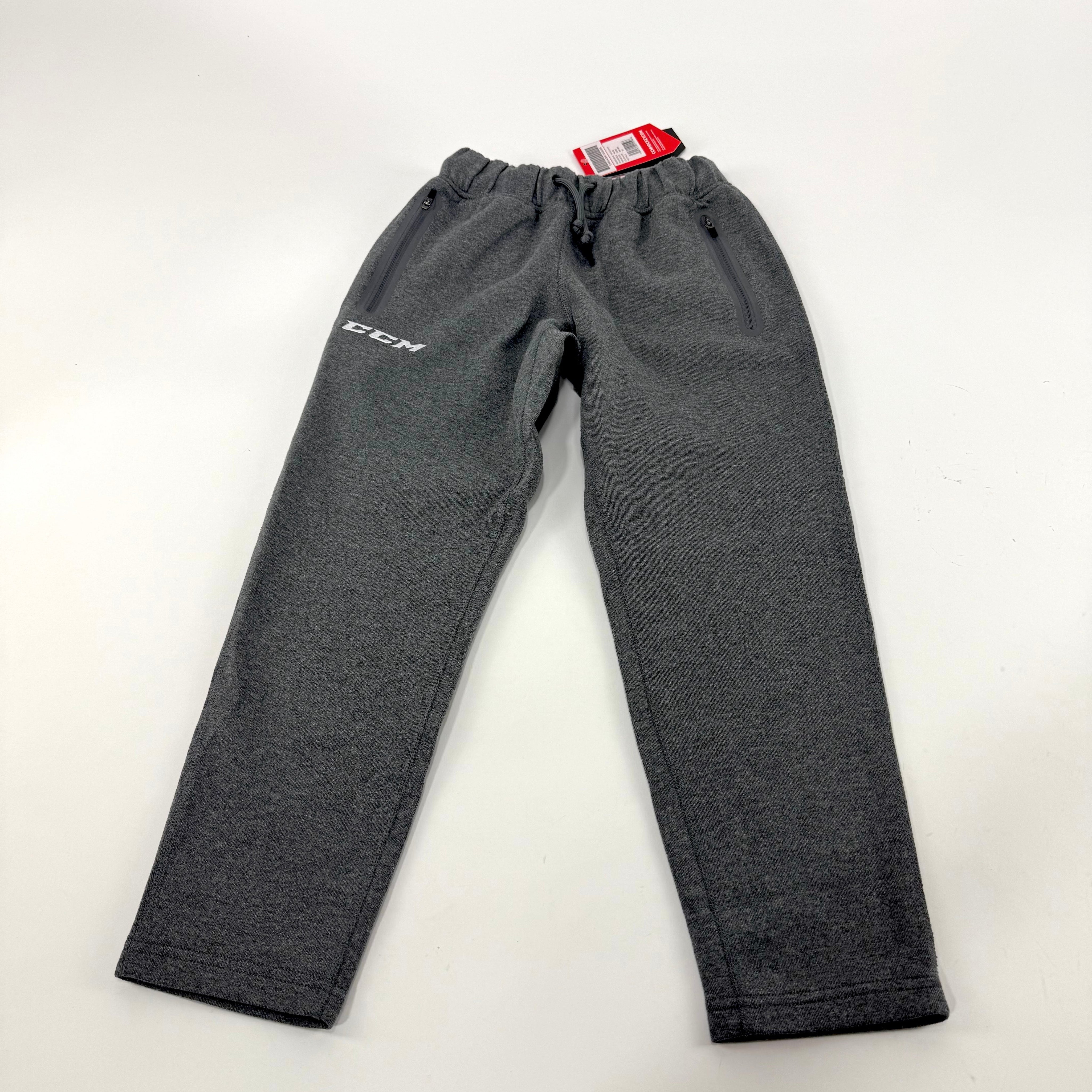 New Dark Grey CCM Youth Premium Tapered Fleece Pant | Youth S | #191520015596 - Top Flight Hockey