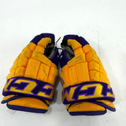 Used Yellow and Purple CCM 4 Roll Pro Gloves | 13" | E519