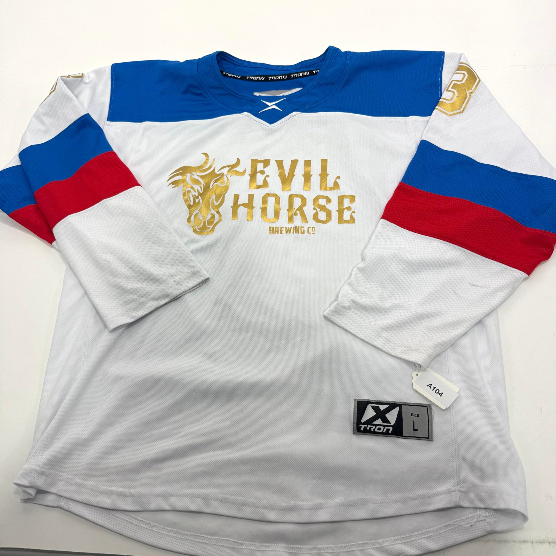 Used White/Blue/Red Tron Evil Horse Brewing Jersey | Large | A104 - Top Flight Hockey