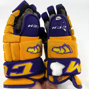 Used Yellow and Purple CCM 4 Roll Pro Gloves | 14" | E461 - Top Flight Hockey