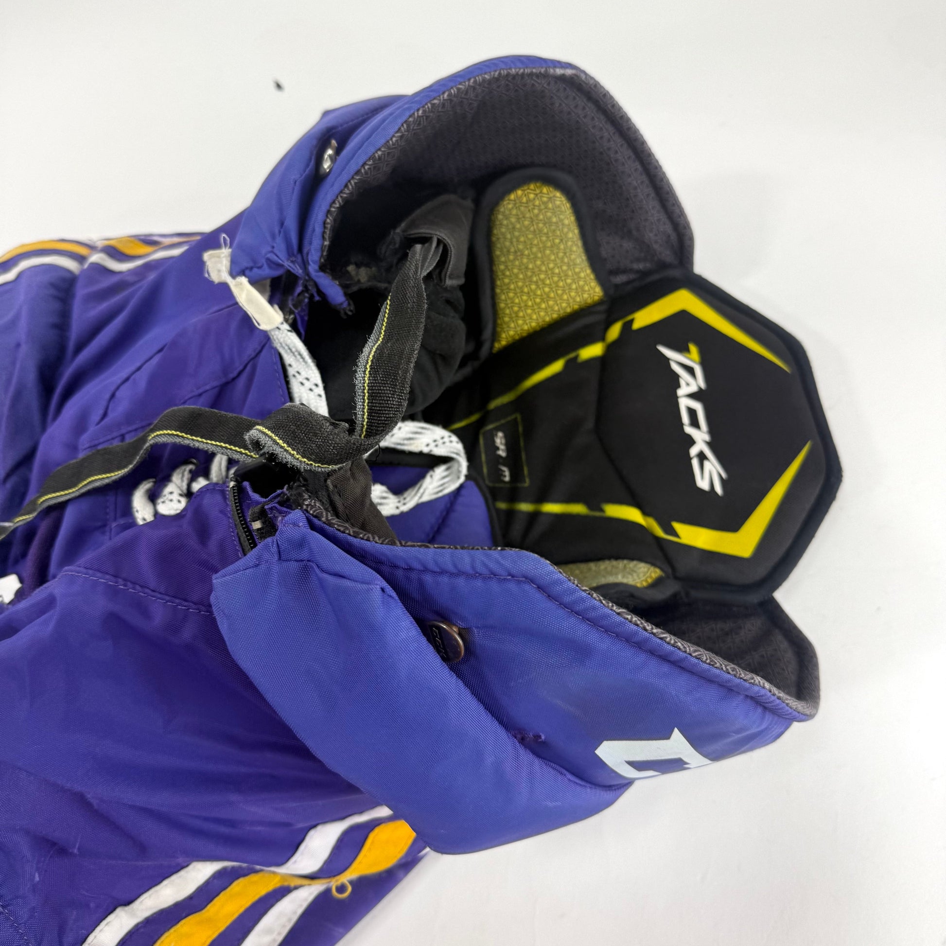 Used Purple/Yellow CCM Tacks 65C Pants | Medium | E552 - Top Flight Hockey
