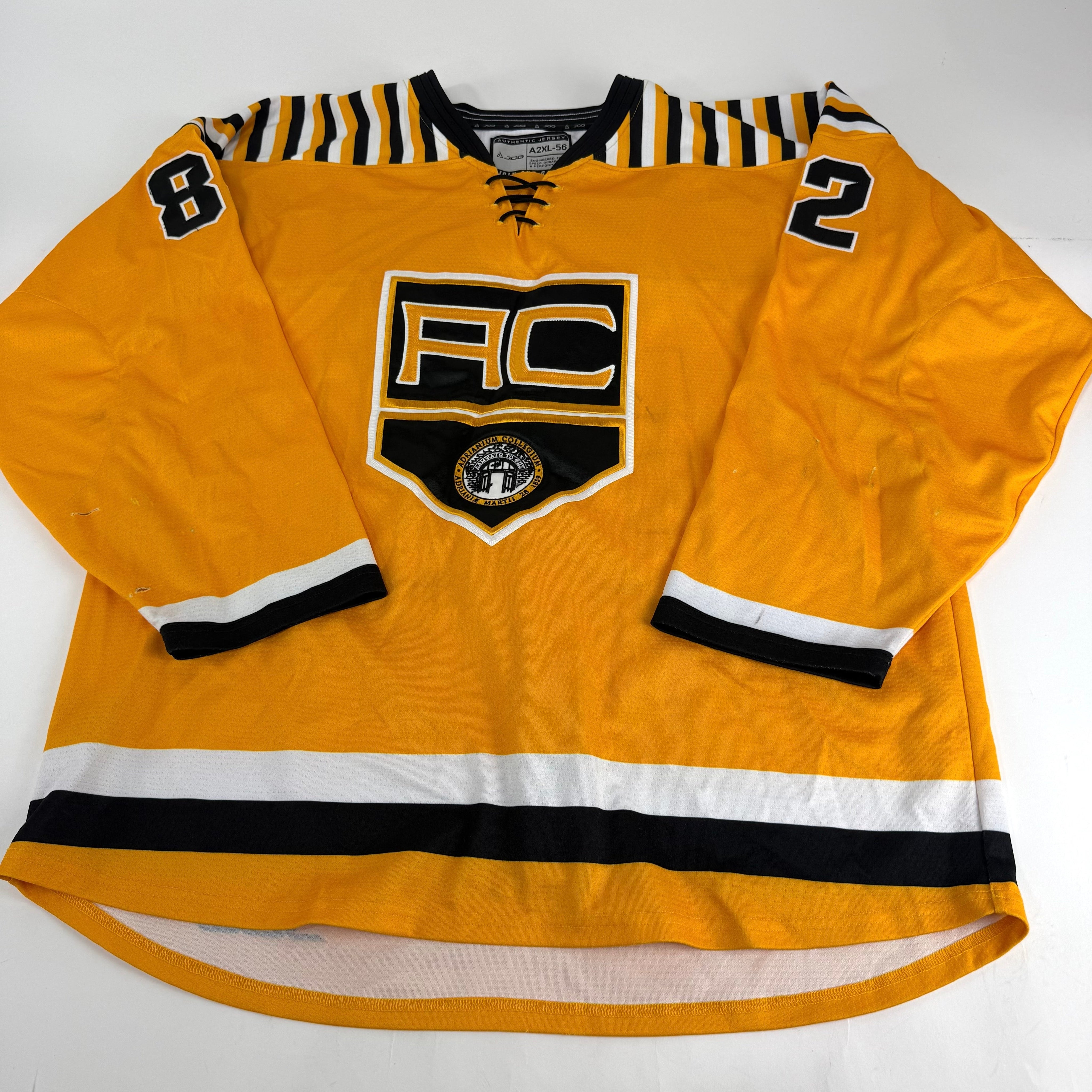Yellow JOG Adrian College Game Jersey | Size 56 | Simmons-Fischer #82 - Top Flight Hockey