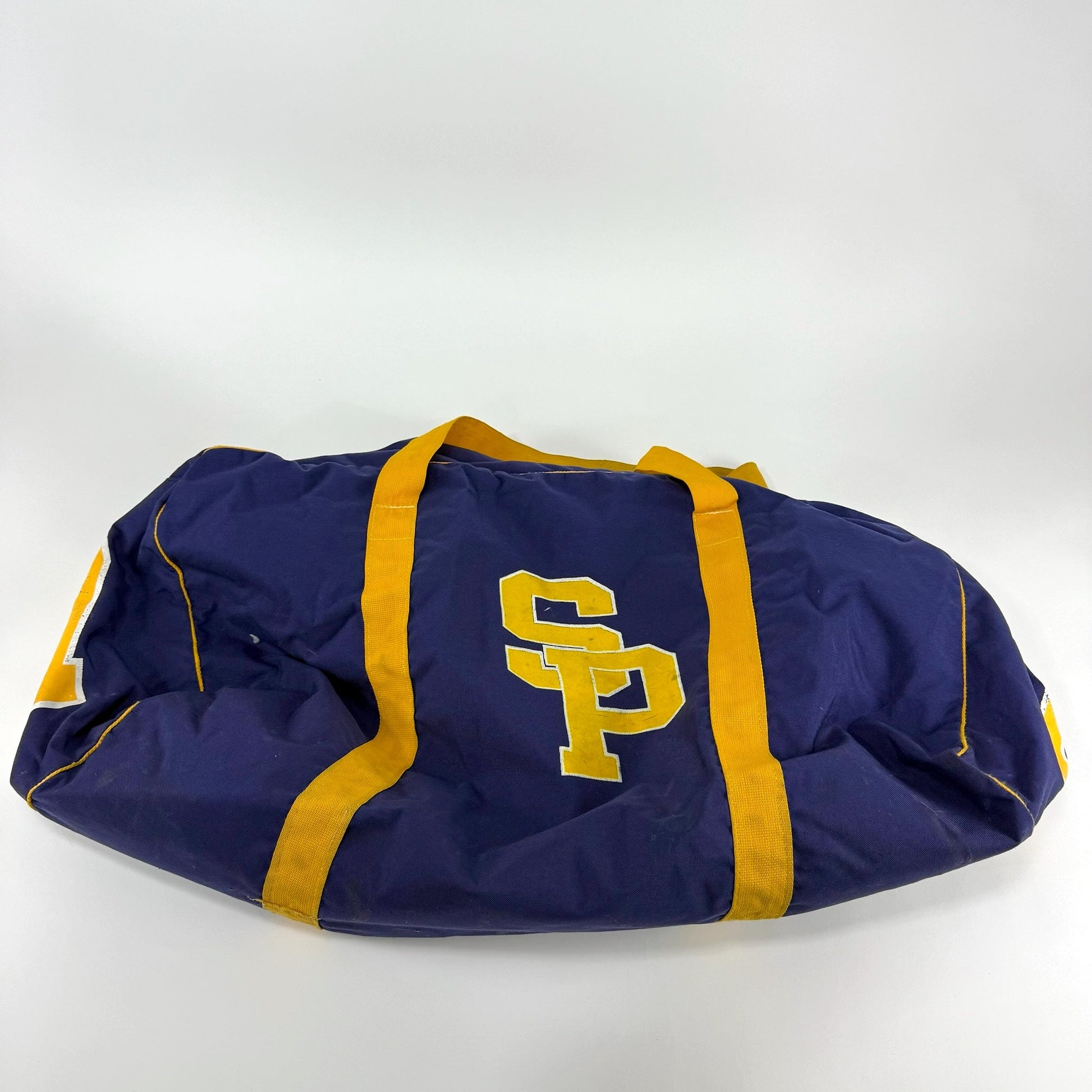 Used Purple and Gold Stevens Point NCAA Player Hockey Bag - Top Flight Hockey