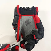 Used Chicago Blackhawks CCM HGCL 13" Gloves | Caleb Jones | L362 - Top Flight Hockey