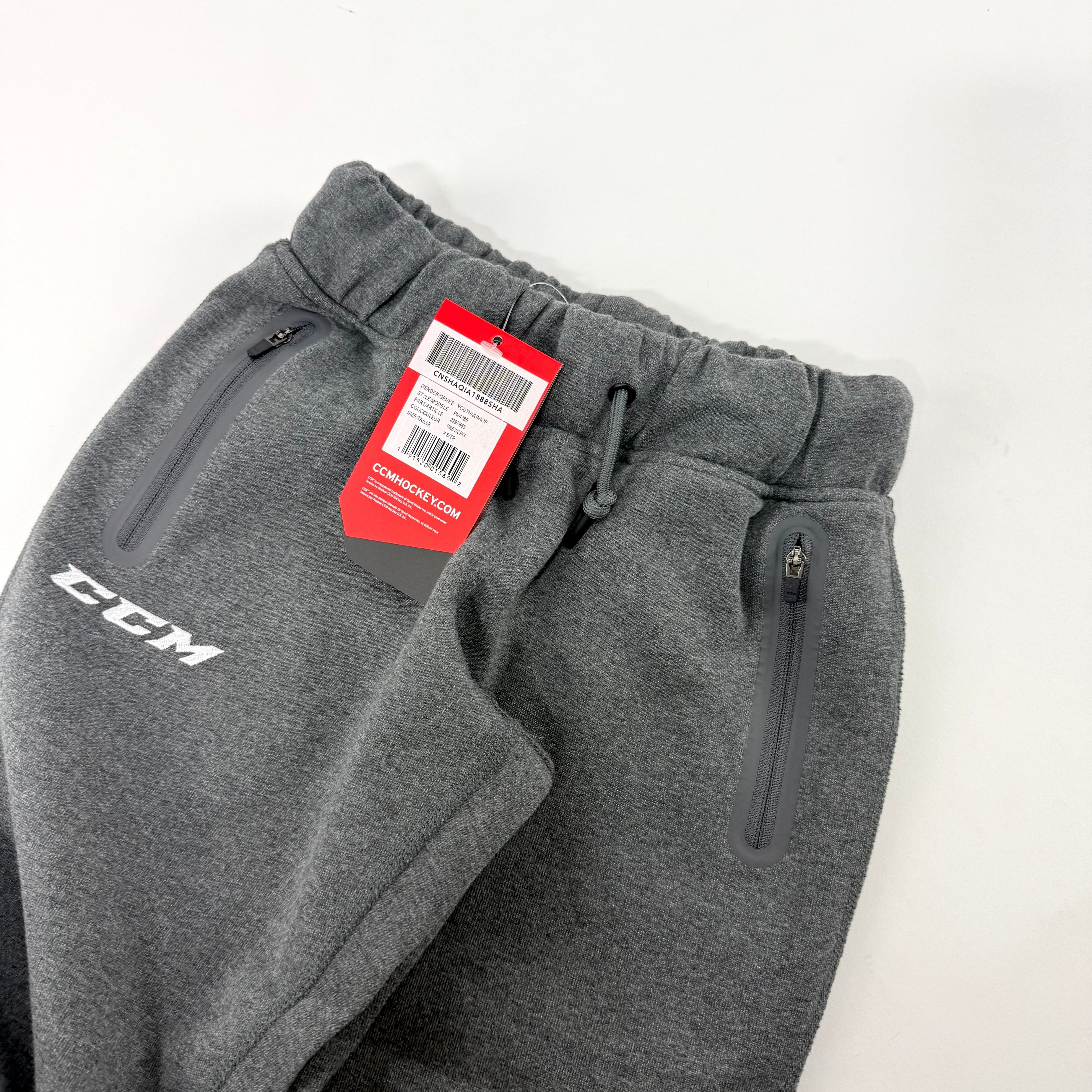 New Dark Grey CCM Youth Premium Tapered Fleece Pant | Youth XS | #191520015602 - Top Flight Hockey