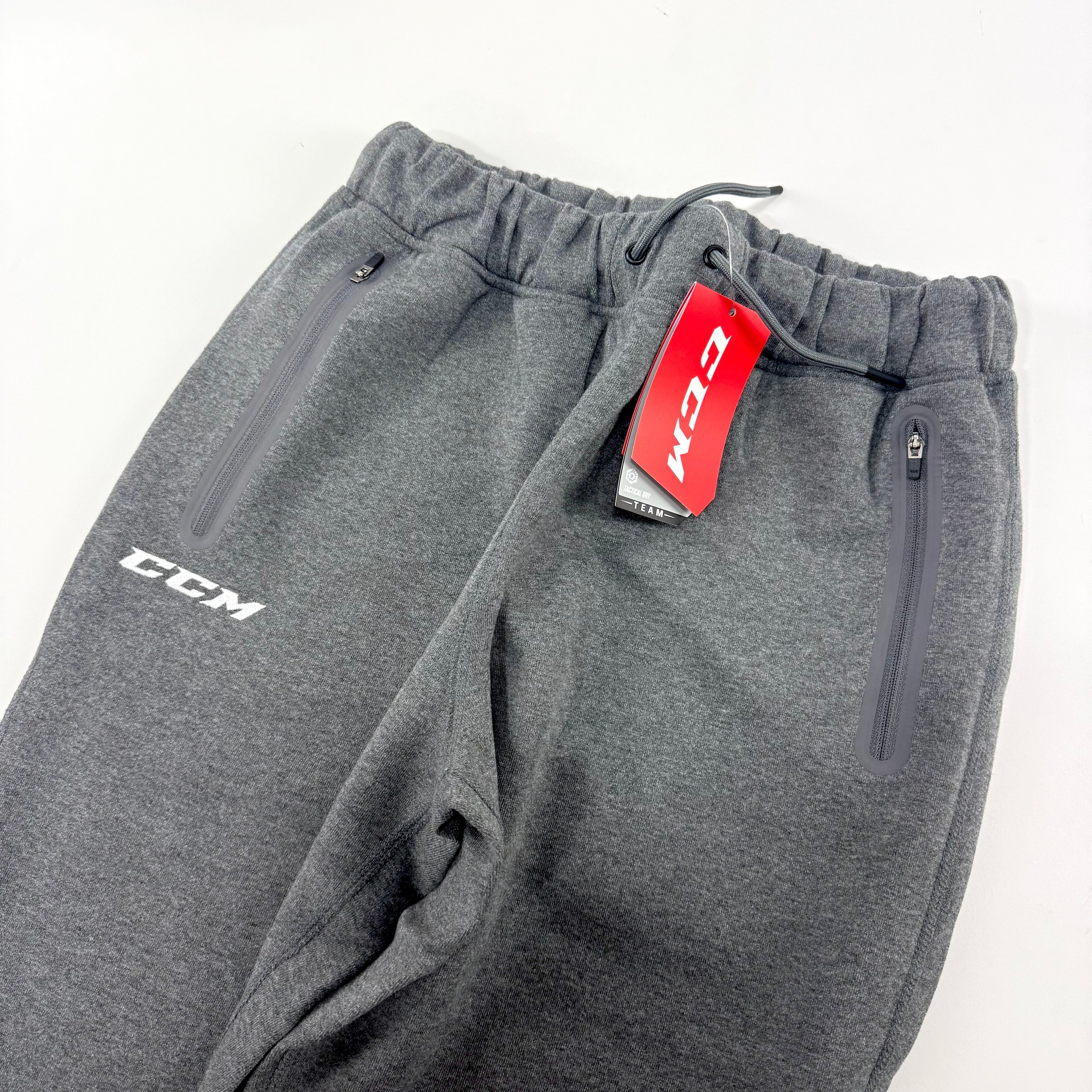 New Dark Grey CCM Youth Premium Tapered Fleece Pant | Youth XL | #191520015633 - Top Flight Hockey