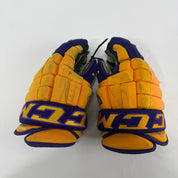 Used Yellow and Purple CCM 4 Roll Pro Gloves | 14" | E451