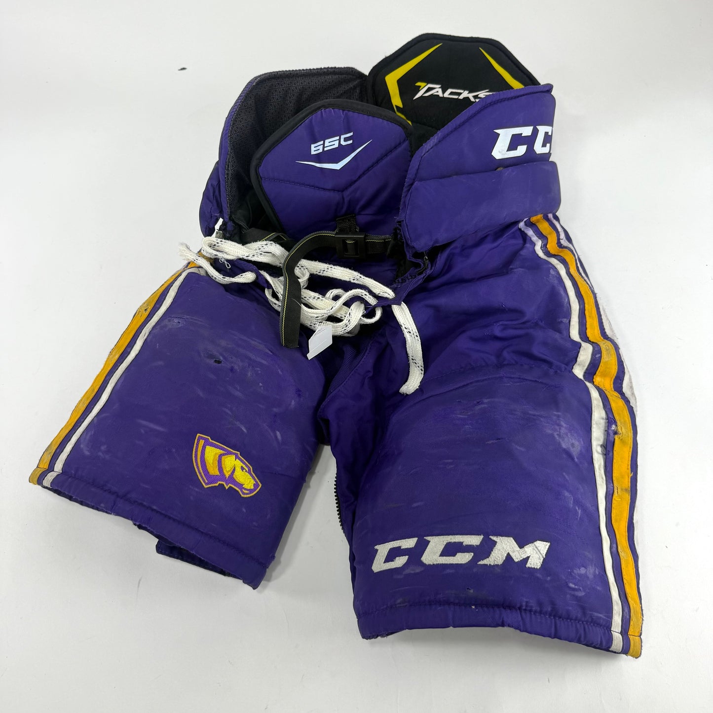 Used Purple/Yellow CCM Tacks 65C Pants | Small | E532 - Top Flight Hockey
