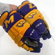 Used Yellow and Purple CCM 4 Roll Pro Gloves | 14" | E451
