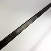 Used Right Black Bauer Vapor Hyperlite 2 | 87 Flex Mackinnon Pro Curve Grip | F303 - Top Flight Hockey