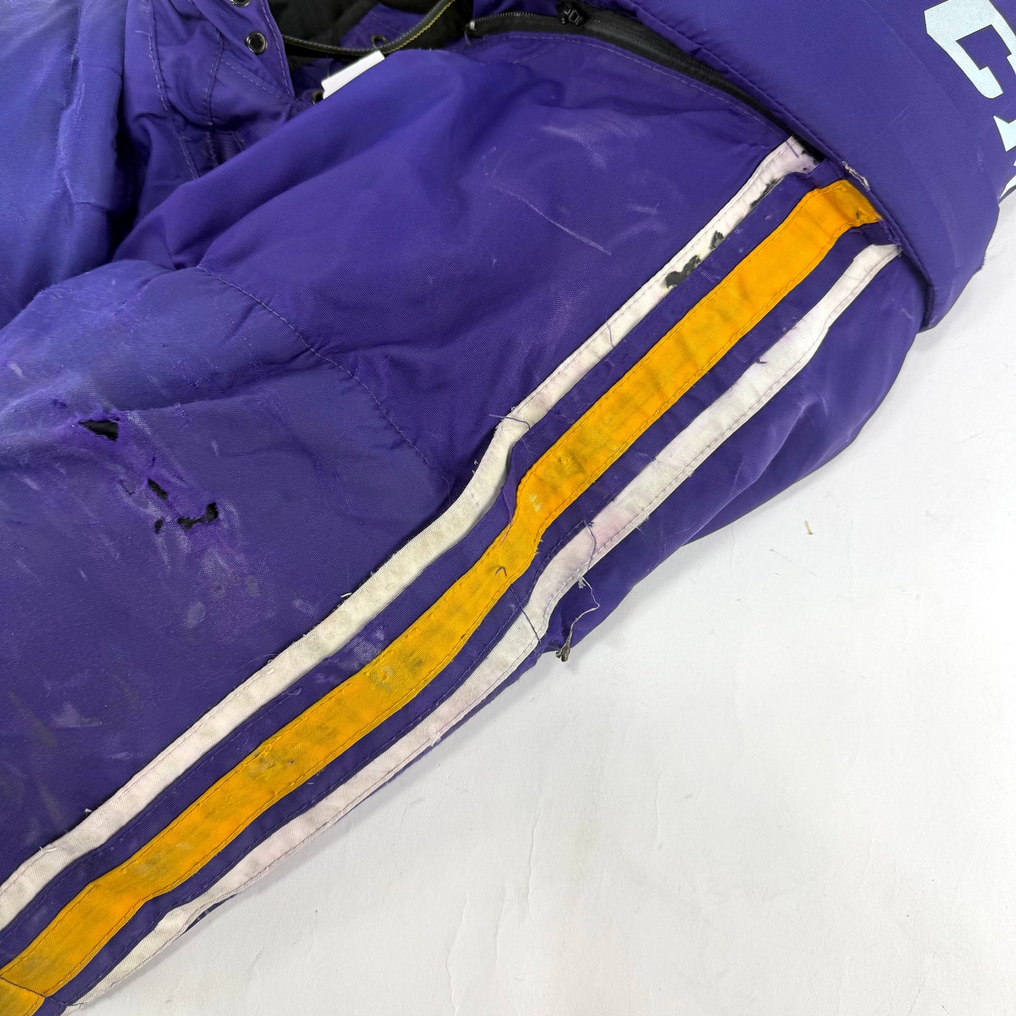 Used Purple/Yellow CCM Tacks 65C Pants | Medium | E548
