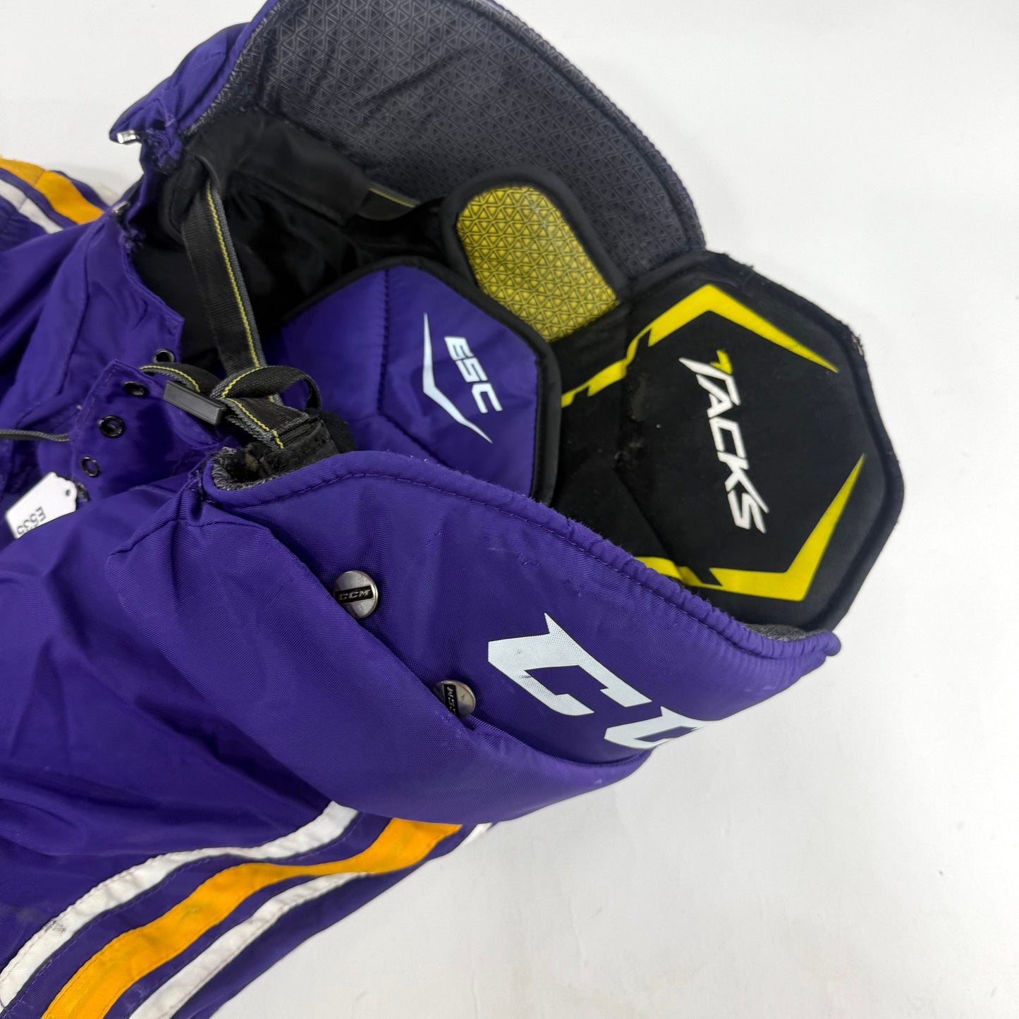 Used Purple/Yellow CCM Tacks 65C Pants | Small | E535